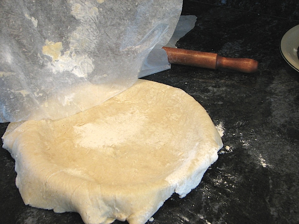 Fitting the dough into the pie plate