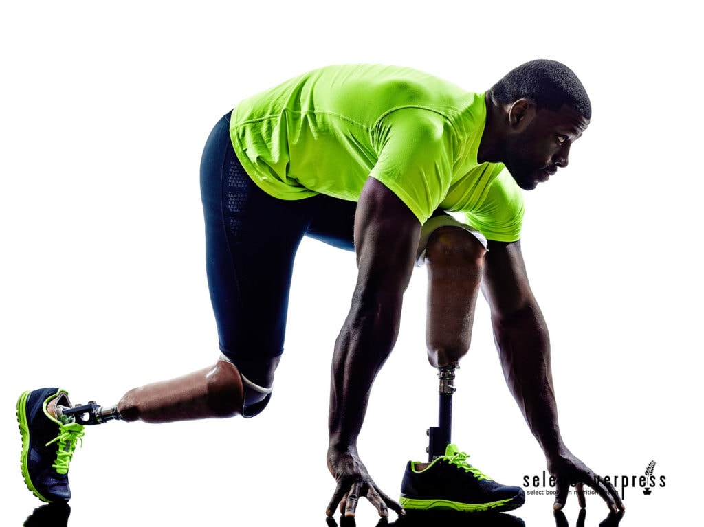 one muscular handicapped man starting line with legs prosthesis in silhouette on white background